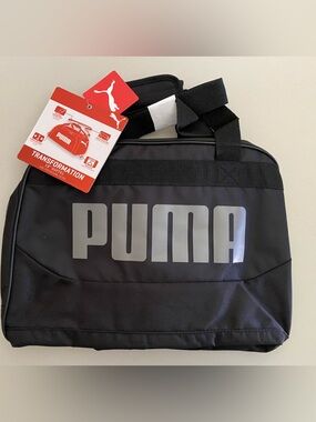 NWT Puma Black Duffel  Bag with Silver Logo